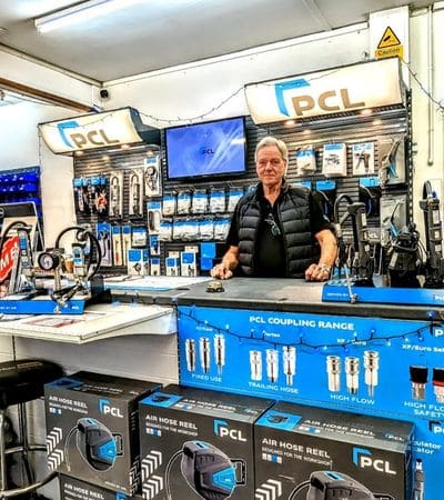 Metro Sales owner Gary standing behind the county in our Surrey air compressor shop.