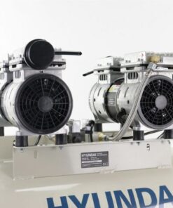Two motors sitting on top of the Hyundai silenced compressor.