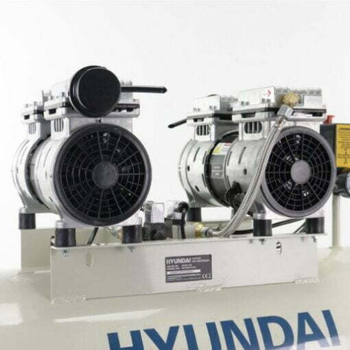 Two motors sitting on top of the Hyundai silenced compressor.