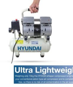 A hand holding the handle of the 8L Hyundai compressor