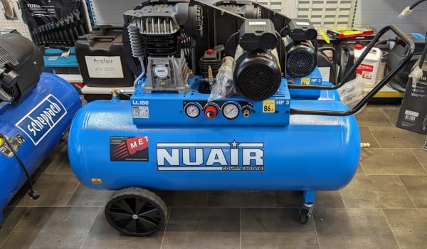 a blue Nuair air compressor in the Metro Sales air compressor centre in Surrey