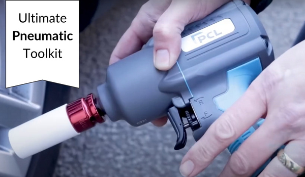 Pneumatic tool kit showing a person using a PCL impact wrench to remove wheel nuts from a car.