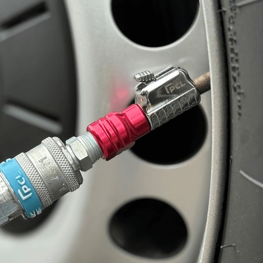 PCL's female straight closed tyre valve connector attached to a car wheel.